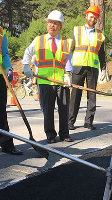 Mayor helping out in the construction site